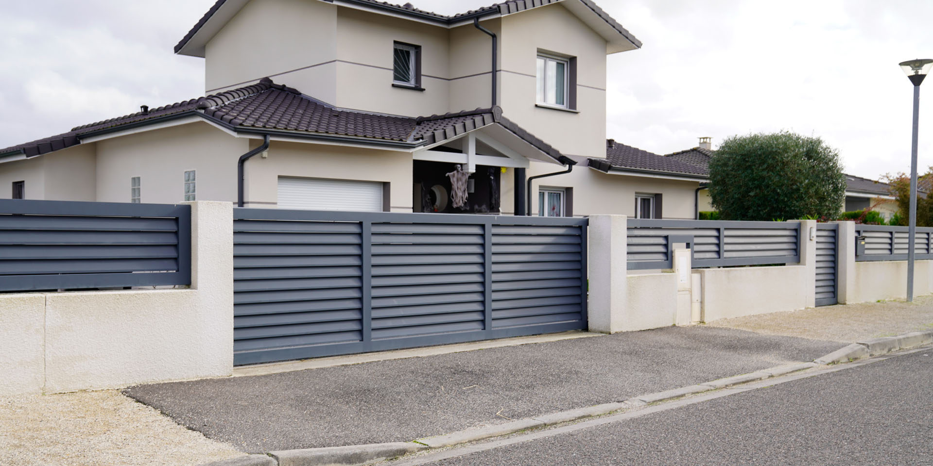 modern door gate of white two storey house driveway entrance gat