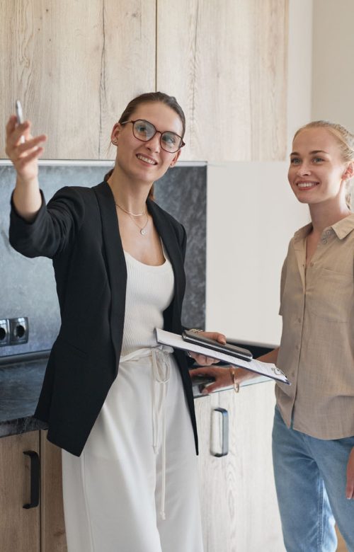 Real Estate Agent Showing Apartment